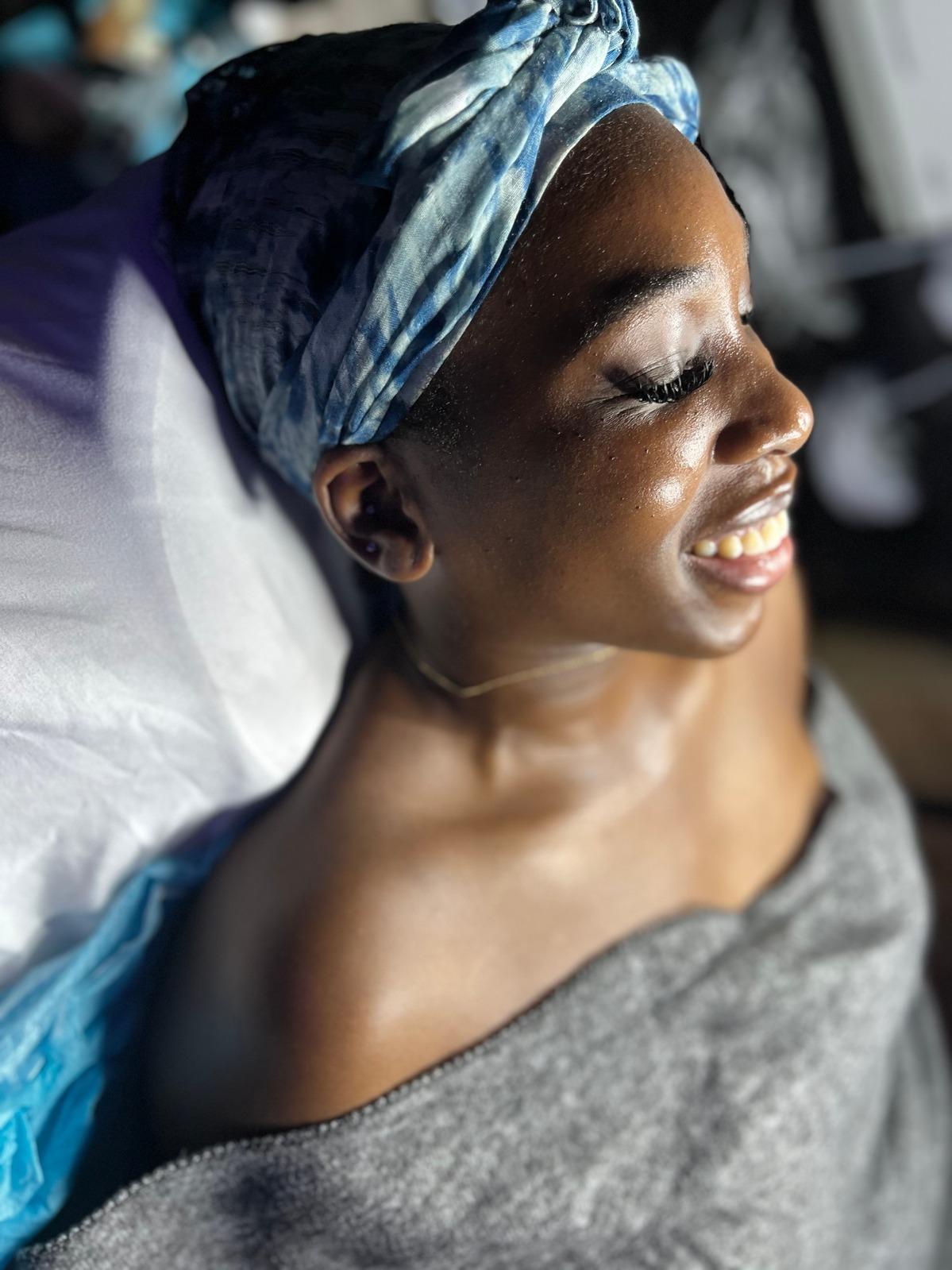 Close-up portrait of a client during a facial treatment